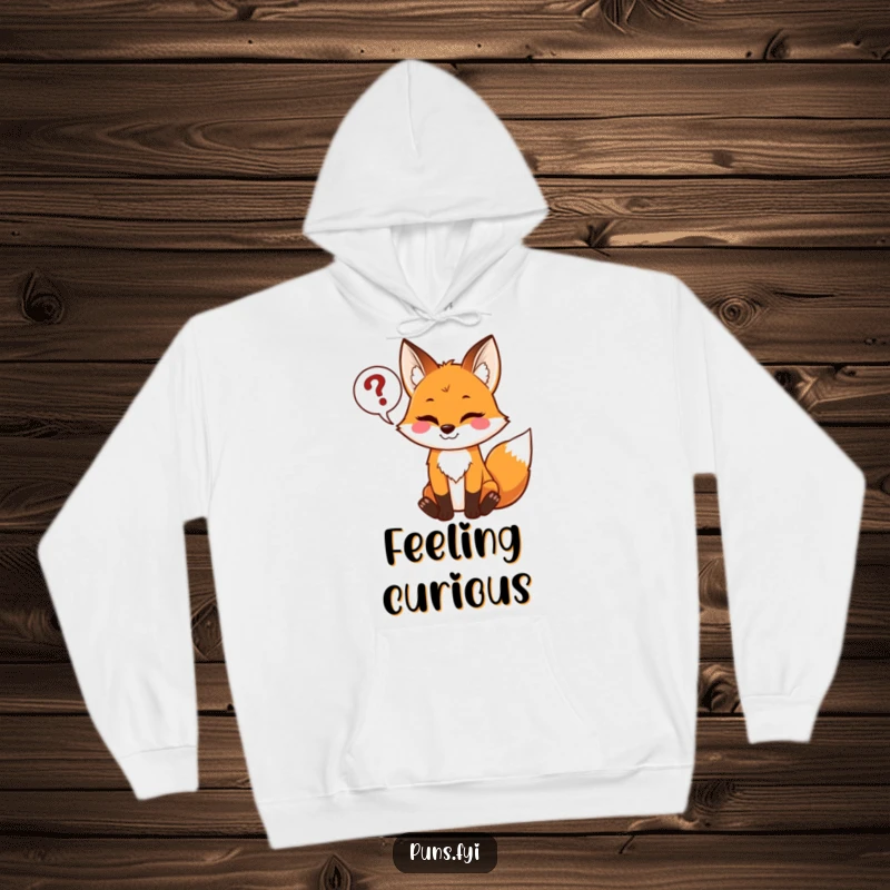 Funny hoodie featuring a playful fox with a mischievous grin, holding a speech bubble packed with question marks.