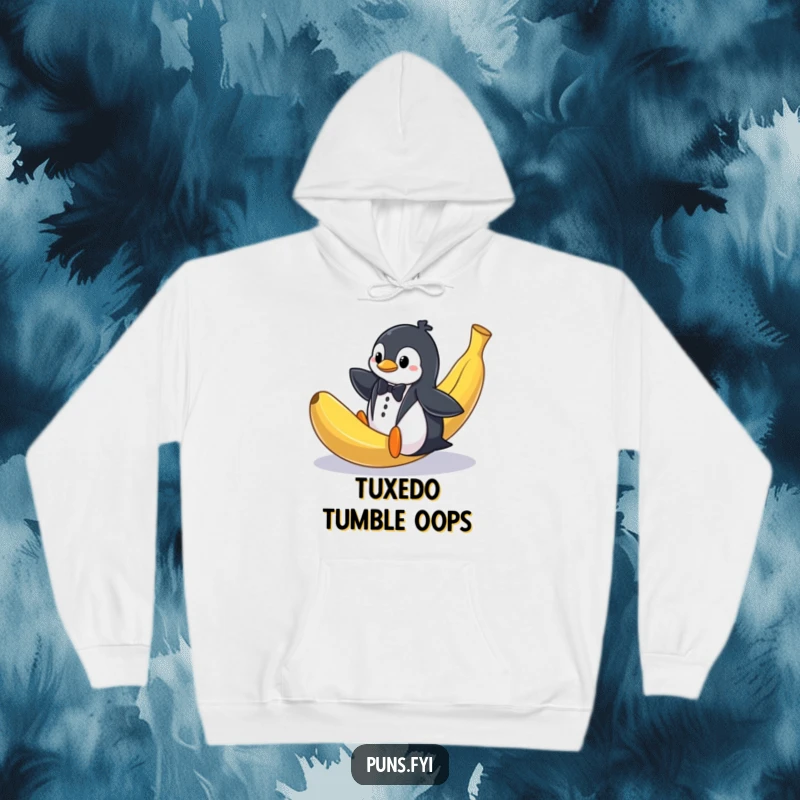 Funny hoodie illustration of a penguin in a tuxedo comically slipping on a massive banana peel, a scene of pure comedic misfortune.
