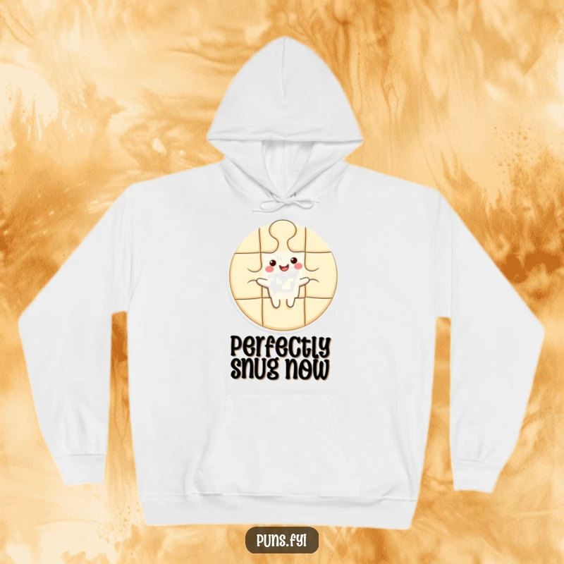 Funny hoodie depicting a cheerful puzzle piece character slotting perfectly into a larger form, radiating warmth and satisfaction.