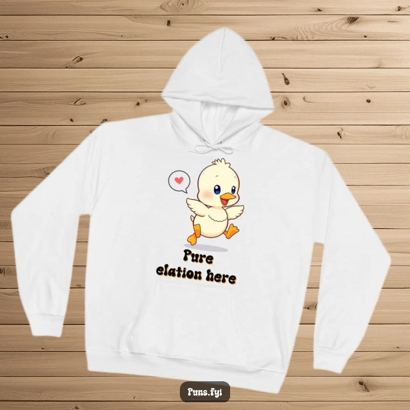Funny hoodie with a kawaii duckling happily leaping, a speech bubble nearby, embodying cheerfulness and comfort.