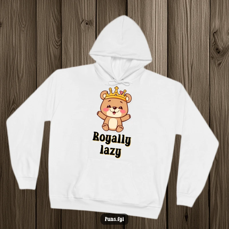 Funny goofy bear cub wearing a majestic crown made entirely of colorful alphabet letters, looking adorable on this warm hoodie.
