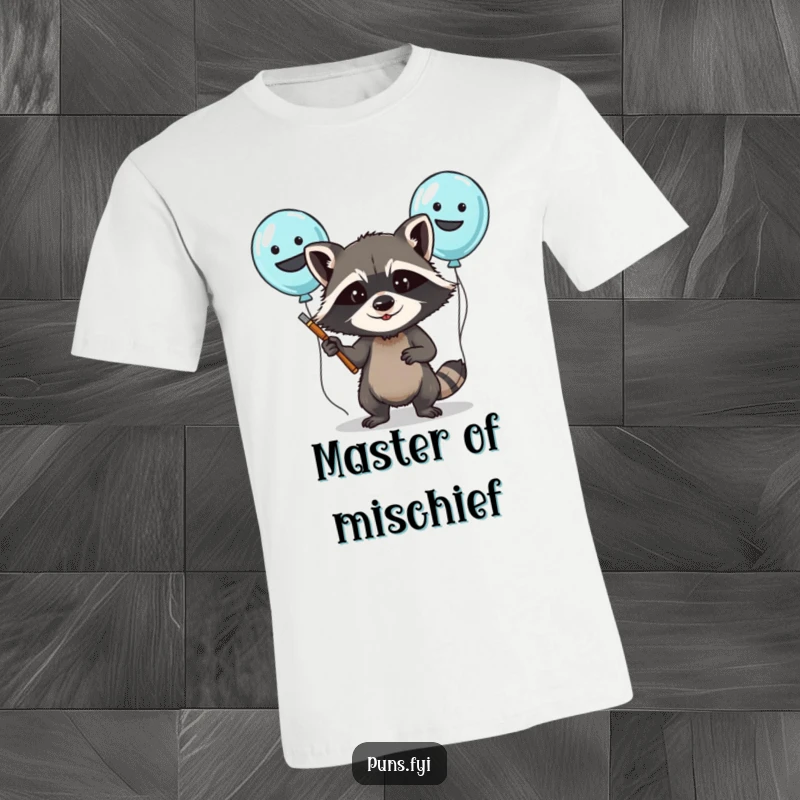Funny t-shirt with a determined raccoon character artfully painting silly faces onto a bunch of vibrant balloons.